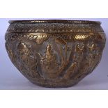 A GOOD 18TH CENTURY INDO PERSIAN BRASS BOWL, decorated in relief with figures roaming in a landscape