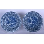 A PAIR OF EARLY 20TH CENTURY CHINESE KANGXI STYLE PORCELAIN DISH, decorated with extensive foliage.