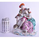 A LARGE 18TH/19TH CENTURY CHELSEA DERBY TYPE PORCELAIN GROUP modelled as a male and female holding a