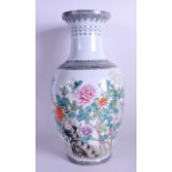 A CHINESE REPUBLICAN PERIOD FAMILLE ROSE VASE bearing Qianlong marks to base, painted with flowers.