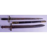 TWO 19TH CENTURY KNIFES one with saw tooth blade. 62 cm long.