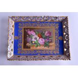 AN EARLY 19TH CENTURY SEVRES STYLE PORCELAIN TRAY painted with a table of flowers on a light blue gr