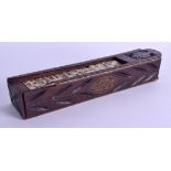 AN 18TH/19TH CENTURY CONTINTAL RECTANGULAR GAMING BOX containing numerous painted bone dominos and d