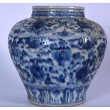 A CHINESE GUAN SHAPED BLUE AND WHITE PORCELAIN VASE, decorated with extensive stylised foliage. 21.5