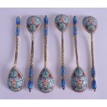 A SET OF SIX 19TH CENTURY RUSSIAN SILVER AND ENAMEL SPOONS. 6 oz. 12.5 cm long. (6)