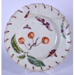 AN 18TH CENTURY CHELSEA PORCELAIN DISH, painted with insects and fruiting vines. 21 cm wide.