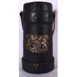AN EARLY 20TH CENTURY MILITARY SHELL CASE, decorated with coat of arms and leather strap. 41 cm high