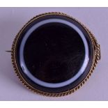 A LATE VICTORIAN BANDED AGATE BROOCH. 2.75 cm wide.