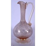 A LARGE EARLY 20TH CENTURY GLASS CLARET JUG OR EWER, formed with a glittered lattice body. 28 cm hig