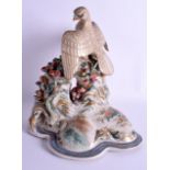 A RARE 19TH CENTURY JAPANESE MEIJI PERIOD SATSUMA FIGURE OF AN EAGLE modelled upon a naturalistic ba