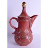 AN UNUSUAL TURKISH TERRACOTTA CARVED EWER AND COVER decorated with gilded sunburst motifs. 28 cm hig