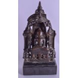 A GOOD 17TH CENTURY INDIAN BRONZE SHRINE GROUP modelled as a seated buddha, the back decorated all o