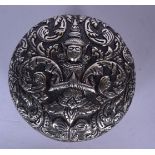 A GOOD SOUTHEAST ASIAN SILVER BOX AND COVER, decorated in relief with a buddha amongst foliage. 7.5