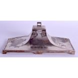 AN ARTS AND CRATS SECESSIONIST MOVEMENT SILVER PLATED DESK STAND decorated with Celtic script. 21 cm