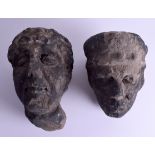 A PAIR OF EARLY TUDOR TYPE CARVED STONE HEADS possibly 16th century. 20 cm x 17 cm.