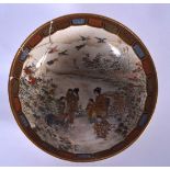 AN EARLY 20TH CENTURY JAPANESE MEIJI PERIOD SATSUMA POTTERY BOWL, decorated with figures in a landsc