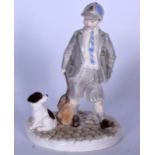 A ROYAL WORCESTER PORCELAIN FIGURINE OF A SCHOOL BOY WALKING HIS DOG, "Can I come too". 19 cm high.