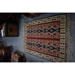 A VINTAGE ANATOLIAN KONYA KILIM RUG, decorated with geometric motifs. 160 cm x 133 cm.