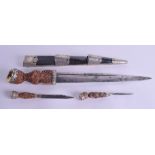 A LATE 19TH CENTURY SCOTTISH WHITE METAL ROYAL SCOTS OFFICERS DIRK DAGGER inset with yellow stones,