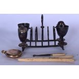 A SILVER PLATED TOAST RACK, together with bone glove stretchers, pocket watch etc. (4)