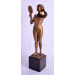 AN ART NOUVEAU GERMAN GILT BRONZE FIGURE OF A FEMALE by H Rieder, modelled holding a mirror upon a m