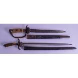 TWO SMALLER ANTIQUE GERMAN ANTLER HORN HANDLED SWORDS one with shell cap to scabbard. 50 cm & 53 cm