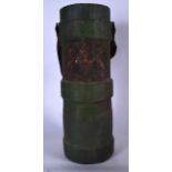 AN EARLY 20TH CENTURY MILITARY SHELL CASE, decorated with coat of arms and leather strap. 53 cm high