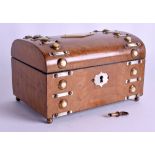 A LATE VICTORIAN WALNUT AND MOTHER OF PEARL DOME TOP CASKET decorated with a lozenge shaped motif. 1