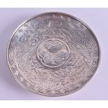 A SMALL 19TH CENTURY JAPANESE MEIJI PERIOD SILVER DISH decorated with flowers and vines. 182 grams.