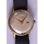 A VINTAGE JUNGHANS TRILASTIC WRISTWATCH. 3.25 cm wide.