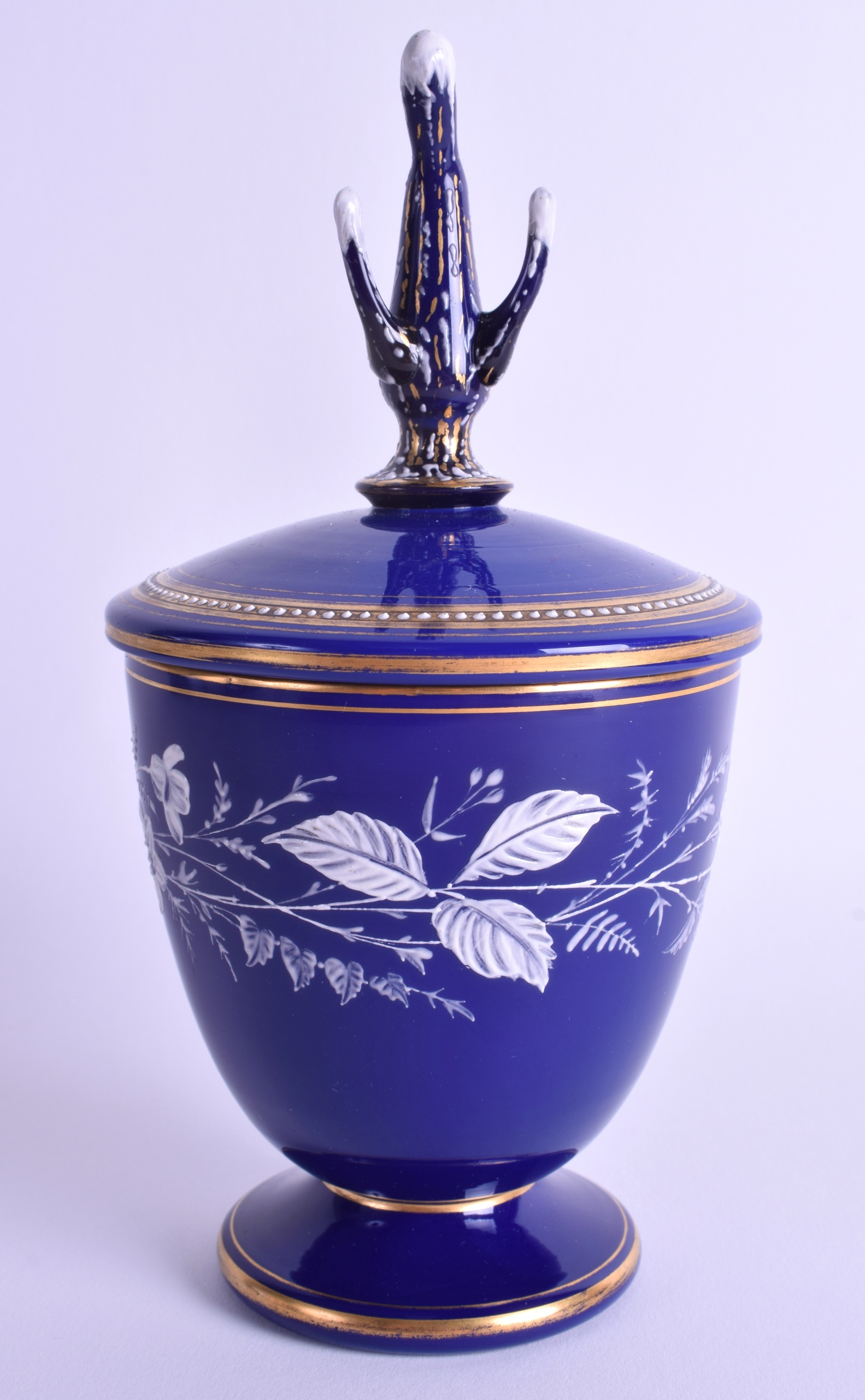 AN EARLY 20TH CENTURY BLUE OPALINE GLASS BOWL AND COVER enamelled with scrolling blue foliage. 19 cm