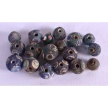 A GROUP OF EIGHTEEN VARIOUS TOGGLES possibly antiquity. (18)