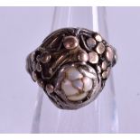 A SILVER GOLD AND PEARL RING. Size H.