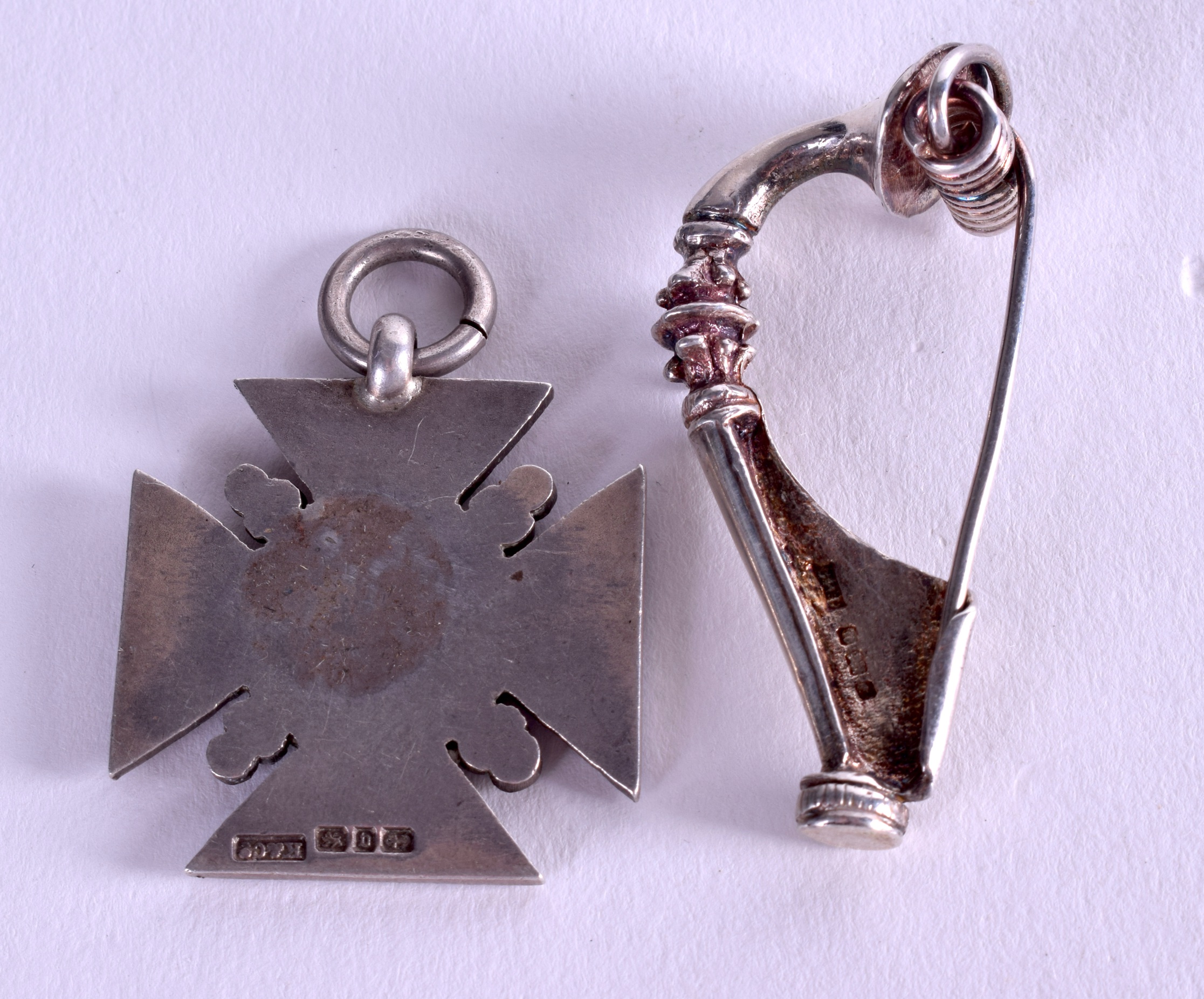 AN ANTIQUE SILVER FOOTBALLMEDAL together with a silver brooch. (2) - Image 2 of 2