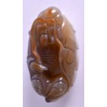 A CHINESE CARVED AGATE FIGURE. 7 cm x 4 cm.