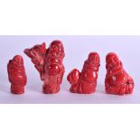 FOUR CHINESE CARVED CORAL TYPE OKIMONO. Largest 6 cm high. (4)