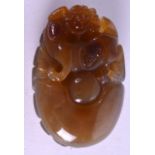 A CHINESE CARVED AGATE FIGURE. 5.5 cm x 8.5 cm.