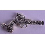 A STERLING SILVER PISTOL WHISTLE. 7.25 cm wide.