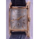 A 14CT GOLD GRUEN WRISTWATCH. 2 cm x 3 cm.