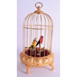 A WEST GERMAN AUTOMATON SINGING BIRD CAGE. 25.5 cm high.