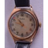 A VINTAGE 9CT GOLD AUDAX WRISTWATCH. 2.25 cm wide.