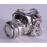 A SILVER CAMERA. 4 cm wide.