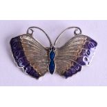 A SILVER AND ENAMEL BUTTERFLY BROOCH. 5.25 cm wide.