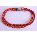 AN EARLY 20TH CENTURY SILVER AND CORAL NECKLACE. 74 grams. Each strand 36 cm long.