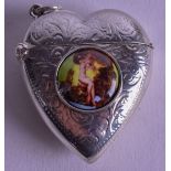 A SILVER HEART SHAPED EROTIC VESTA CASE. 2.5 cm wide.