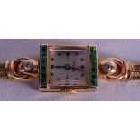 A 14CT GOLD EMERALD AND DIAMOND WRISTWATCH. 24.4 grams overall. 15 cm long.