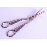 A PAIR OF ANTIQUE SILVER SCISSORS. 4.7 oz. 17 cm long.