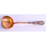 AN EARLY 20TH CENTURY RUSSIAN SILVER GILT AND ENAMEL SPOON. 15.5 cm long.