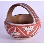 AN EARLY SOUTH AMERICAN TERRACOTTA BASKET. 10 cm wide.