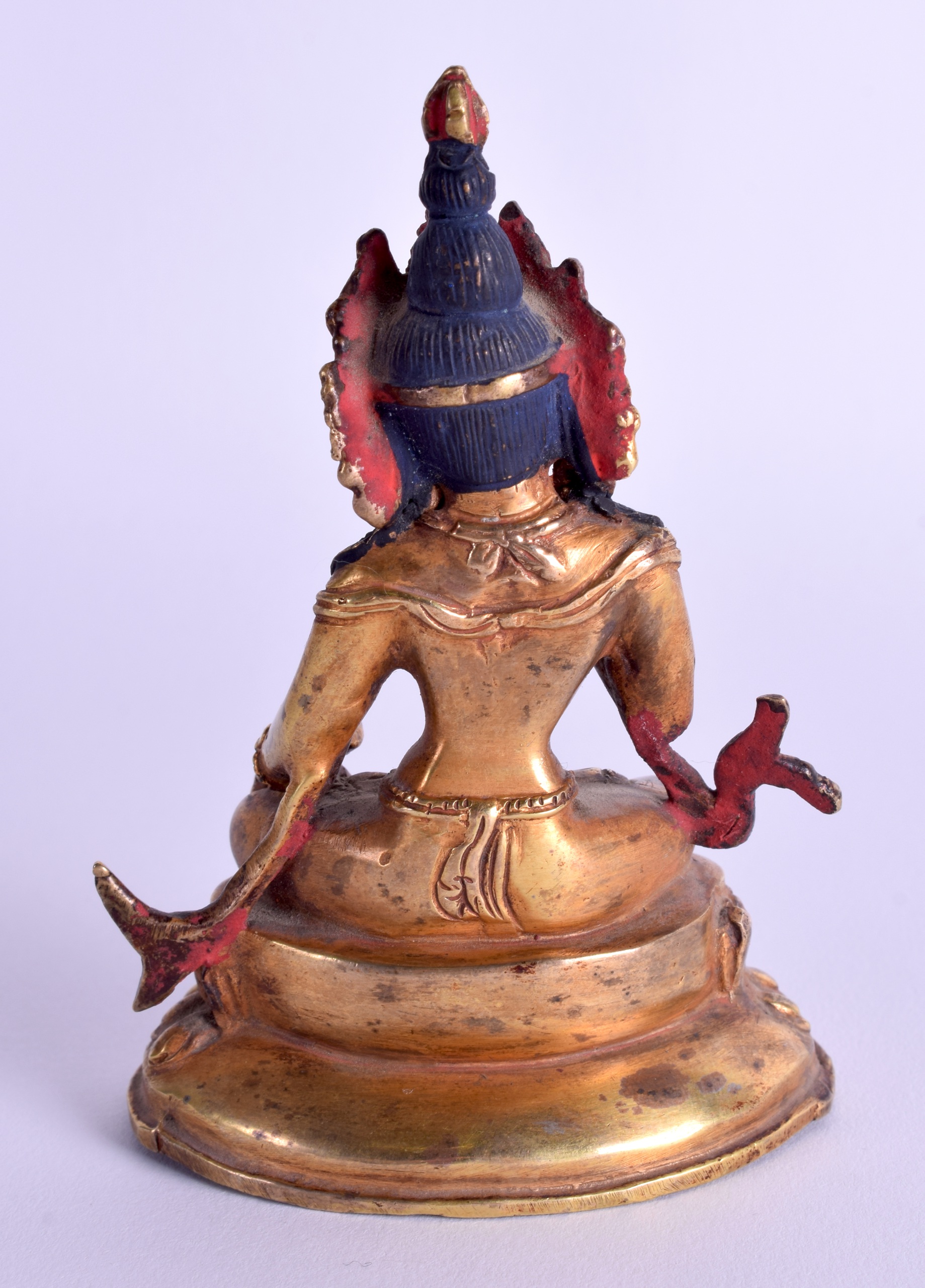 AN EARLY 20TH CENTURY CHINESE TIBETAN GILT BRONZE BUDDHA modelled upon a triangular base. 8 cm high. - Image 2 of 3